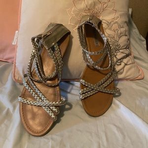 Gold Steve Madden sandals with zipper